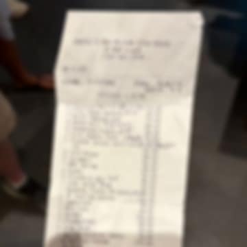 A photo of a restaurant receipt